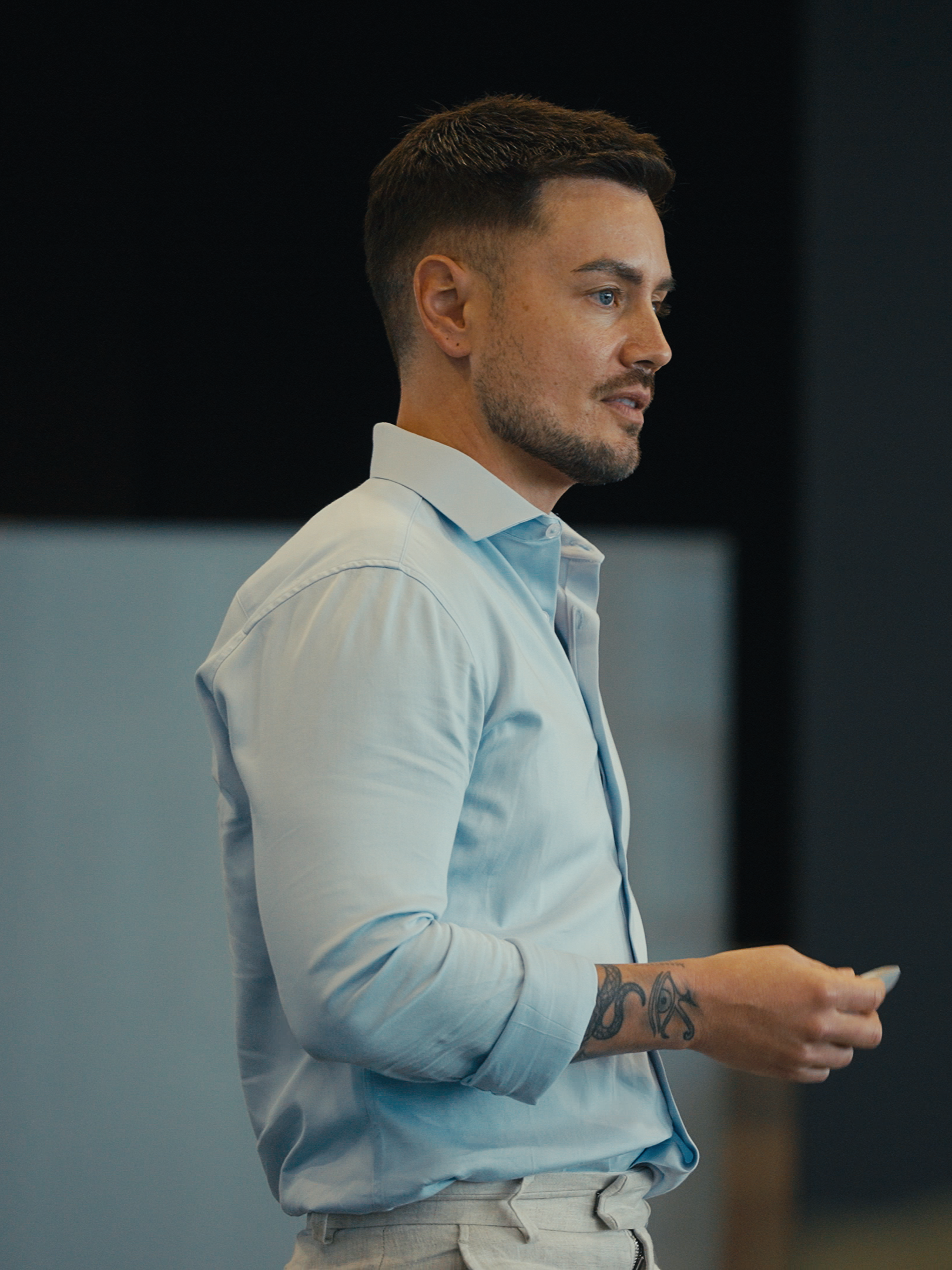Mitch Wallis mid-delivery in a workshop room